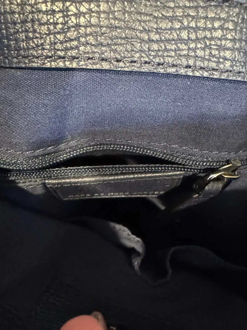 Marc Jacobs Pebbled Leather and suede bucket crossbody bag.
